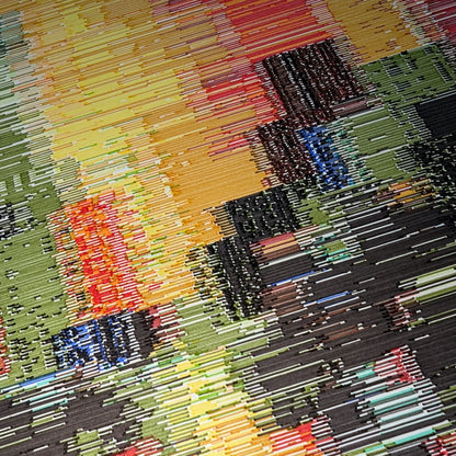 The image is a collage of various abstract shapes and patterns, including lines, rectangles, and squares, in a vibrant and colorful composition.